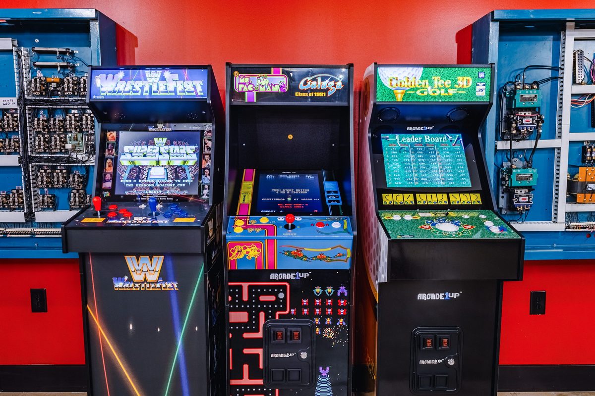 Arcade cabinets in the Neighborhood House Speakeasy game room