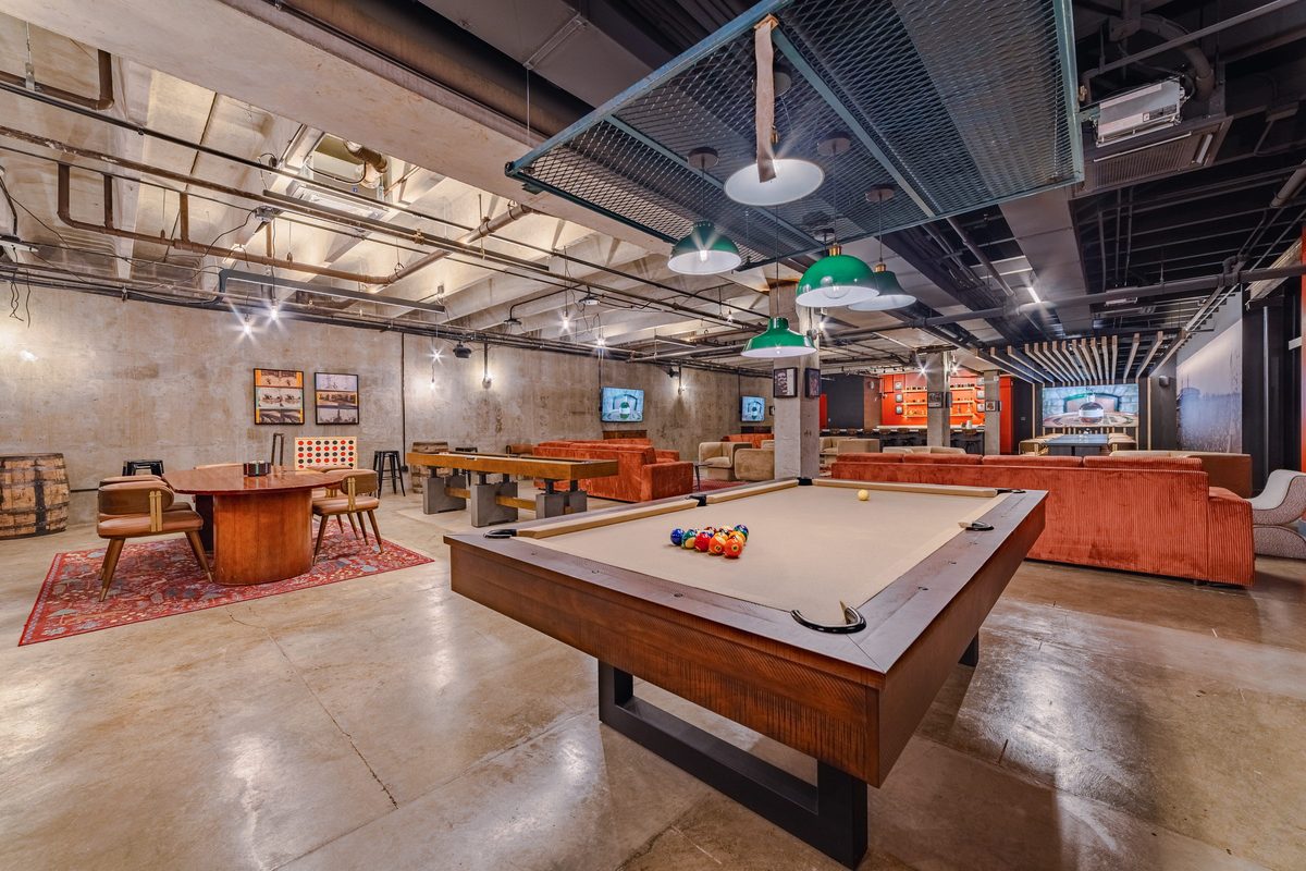 Pool table in the Neighborhood House Speakeasy game room